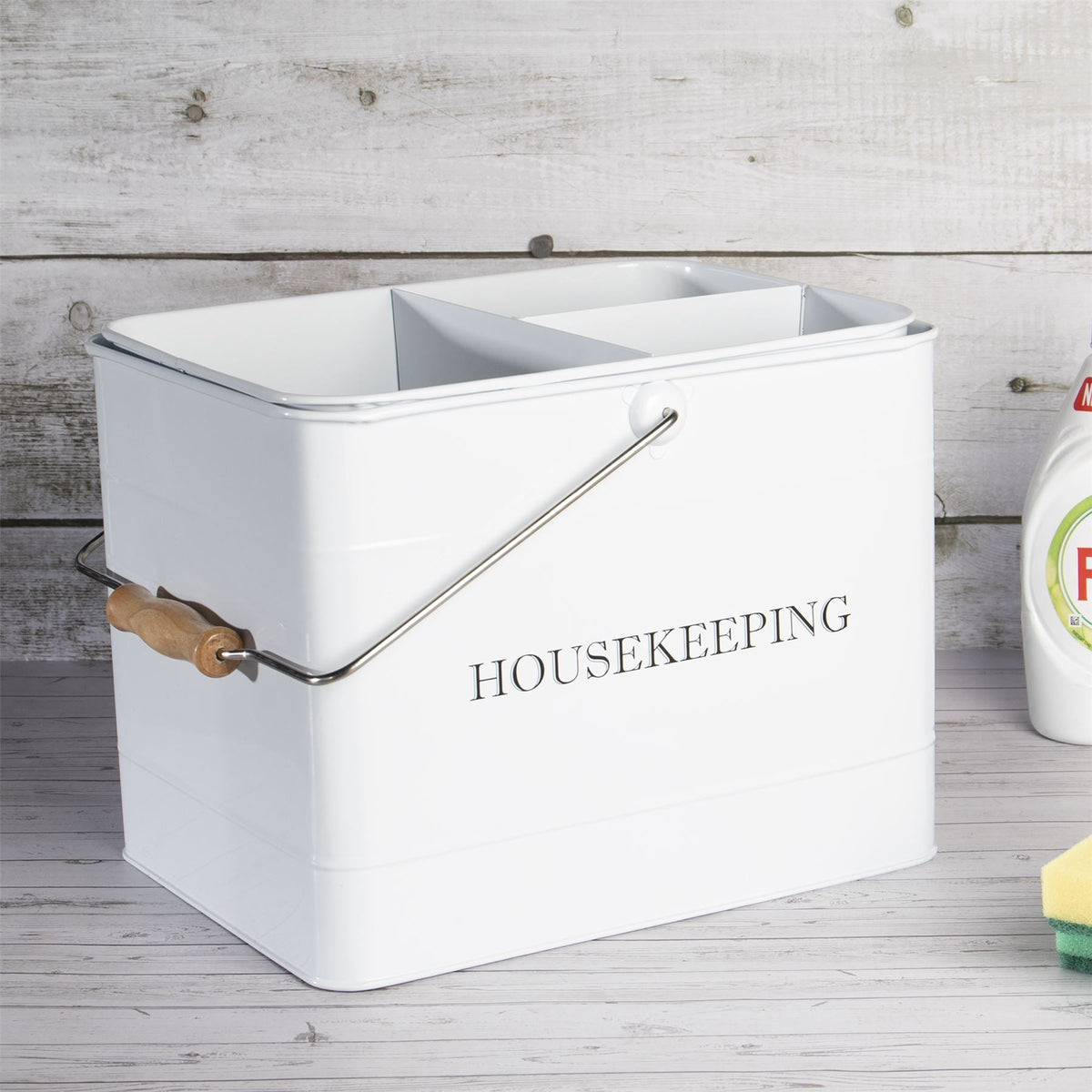 Vintage cleaning caddy white filled with cleaning supplies